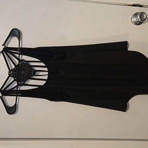 Black Women's Silky Top With Crochet Emblem On Back